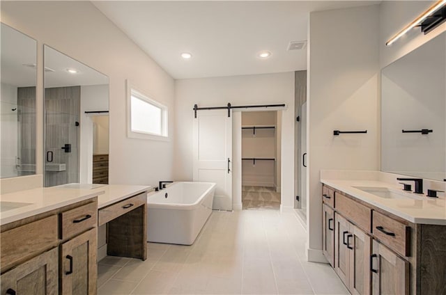 7551 NW Gower Ave, Kansas City, MO 64151 - full bath featuring two vanities, a shower stall, a freestanding bath, and a sink