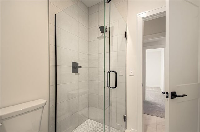 7551 NW Gower Ave, Kansas City, MO 64151 - full bathroom with toilet, a stall shower, and tile patterned floors