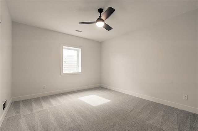 7551 NW Gower Ave, Kansas City, MO 64151 - carpeted empty room featuring baseboards, visible vents, and a ceiling fan