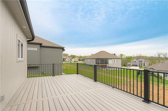 7551 NW Gower Ave, Kansas City, MO 64151 - wooden deck with a residential view and a lawn