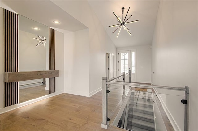 7551 NW Gower Ave, Kansas City, MO 64151 - interior space featuring lofted ceiling, wood finished floors, recessed lighting, and baseboards