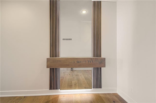 7551 NW Gower Ave, Kansas City, MO 64151 - details featuring recessed lighting, visible vents, wood finished floors, and baseboards