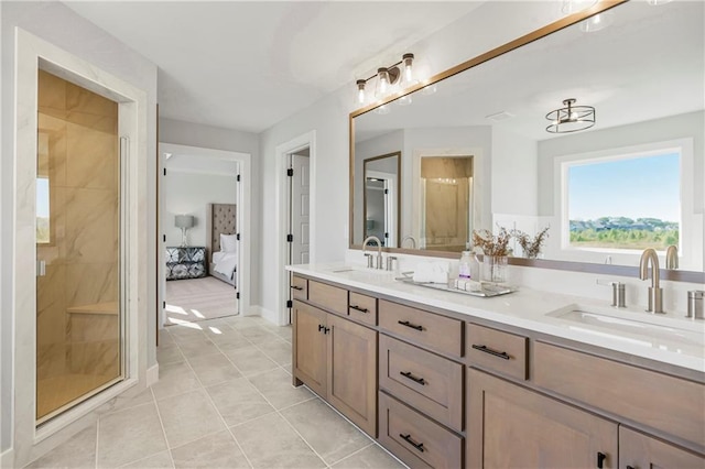 bathroom with vanity, walk in shower, and tile patterned floors