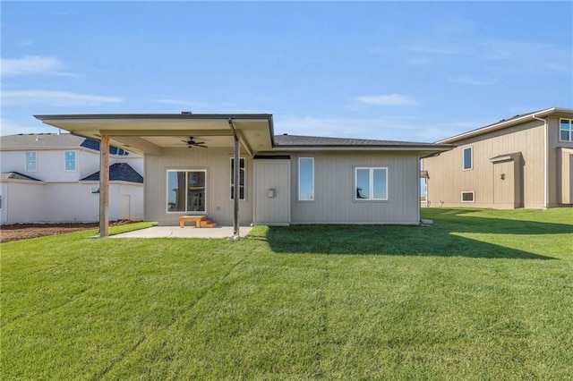 16879 S Cardinal St, Olathe, KS 66062 - back of house with a ceiling fan, a patio area, and a lawn