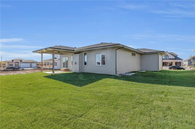 16879 S Cardinal St, Olathe, KS 66062 - back of house featuring a lawn and a patio area