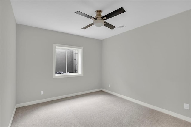 16879 S Cardinal St, Olathe, KS 66062 - empty room featuring a ceiling fan, carpet, and baseboards