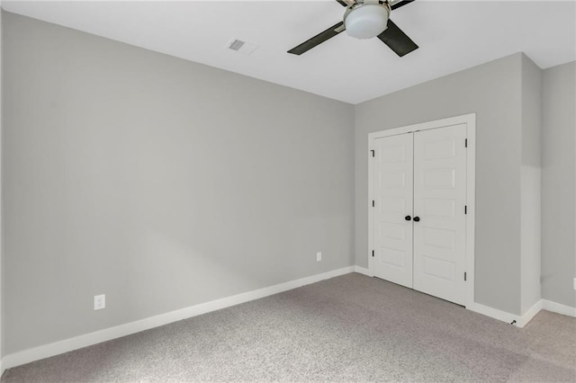 16879 S Cardinal St, Olathe, KS 66062 - unfurnished bedroom featuring carpet, baseboards, a closet, and a ceiling fan
