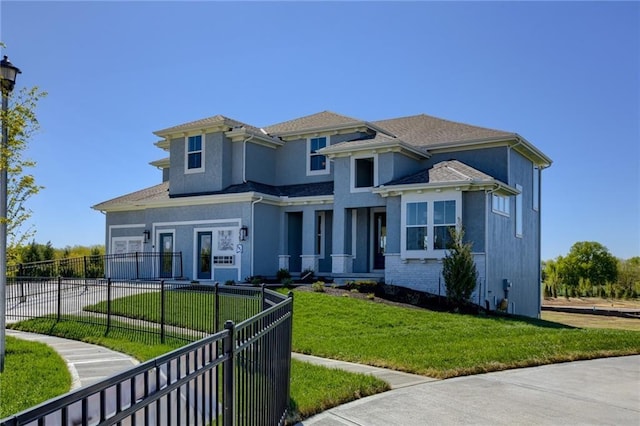 2461 W 176th St, Overland Park, KS 66085 - prairie-style house with a fenced front yard, stucco siding, and a front lawn