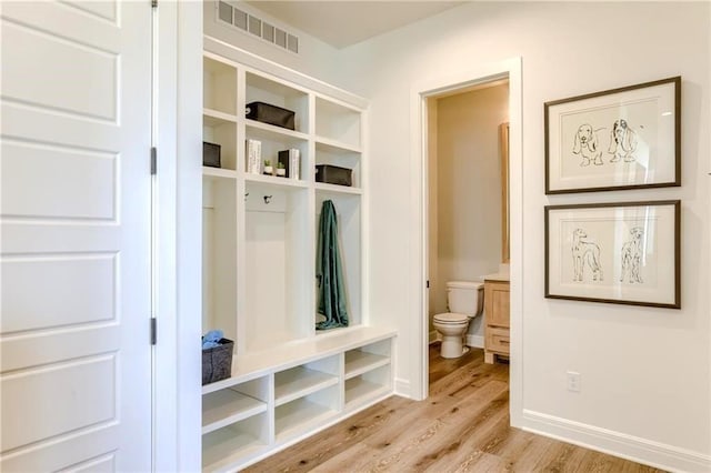 2461 W 176th St, Overland Park, KS 66085 - mudroom with visible vents, baseboards, and light wood-style flooring
