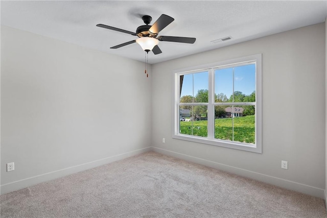 unfurnished room featuring carpet flooring and ceiling fan