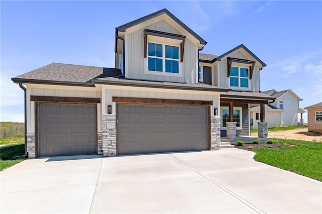 view of front of property featuring a garage