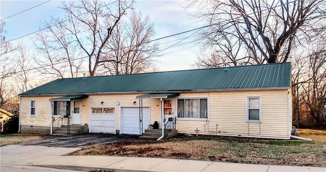 view of front of home featuring a garage