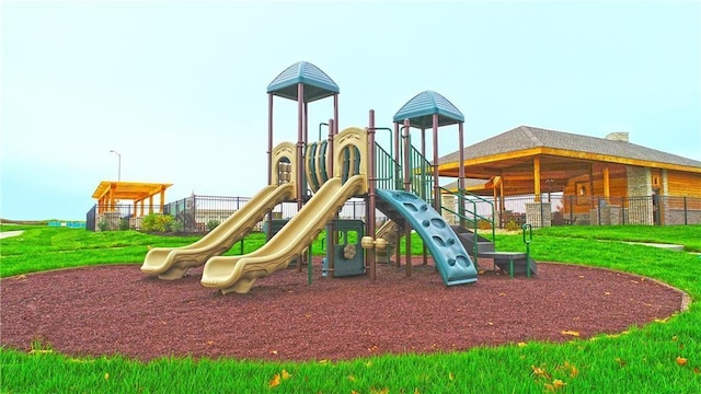 view of playground with a yard