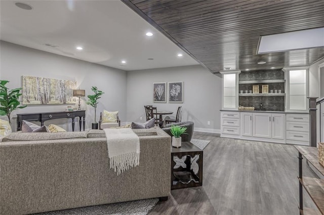 living room with dark hardwood / wood-style floors