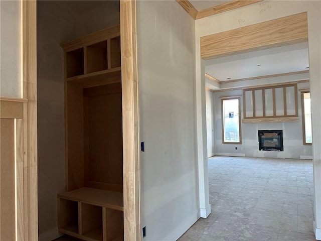 mudroom featuring crown molding