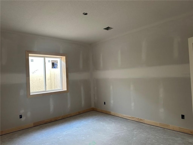 empty room featuring concrete flooring