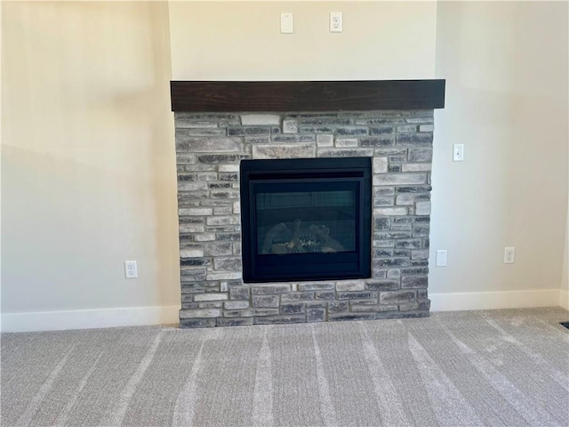 interior details with carpet flooring and a fireplace