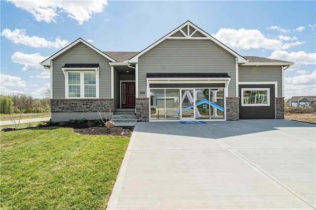 craftsman-style home with a front lawn