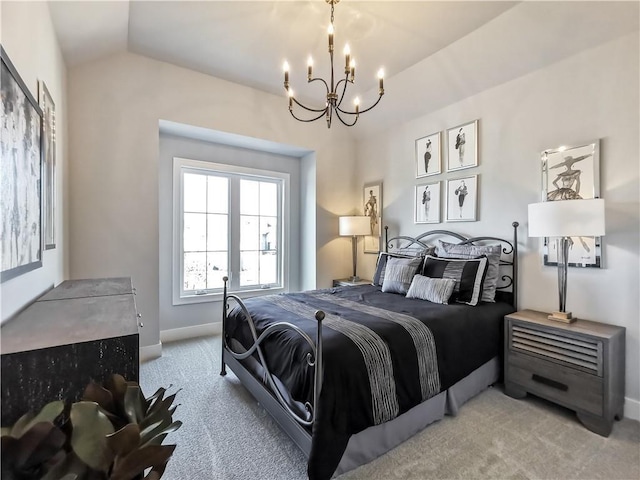 carpeted bedroom with an inviting chandelier and lofted ceiling