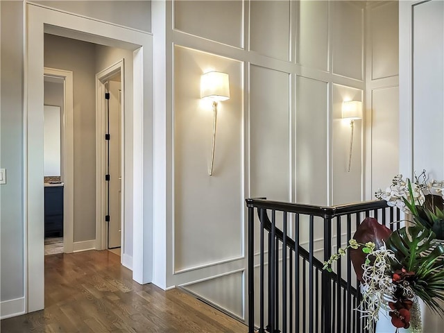 hall with dark hardwood / wood-style flooring