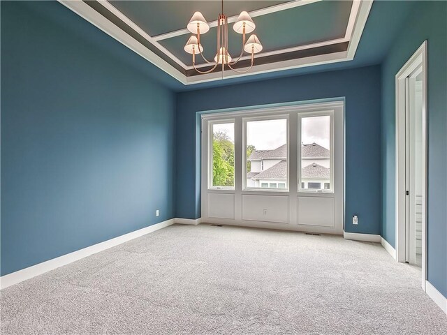 9301 W 168th St, Overland Park, KS 66085 - unfurnished room with carpet, a chandelier, baseboards, and a tray ceiling