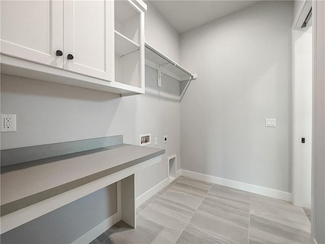 9301 W 168th St, Overland Park, KS 66085 - washroom featuring hookup for an electric dryer, cabinet space, hookup for a washing machine, and baseboards