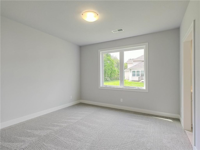 9301 W 168th St, Overland Park, KS 66085 - empty room with light carpet and baseboards