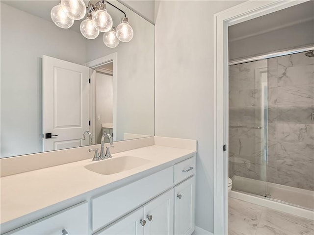 9301 W 168th St, Overland Park, KS 66085 - bathroom with marble look tiles, a marble finish shower, vanity, a chandelier, and toilet
