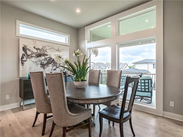 16724 Hayes St, Overland Park, KS 66085 - dining area featuring baseboards and light wood-style flooring
