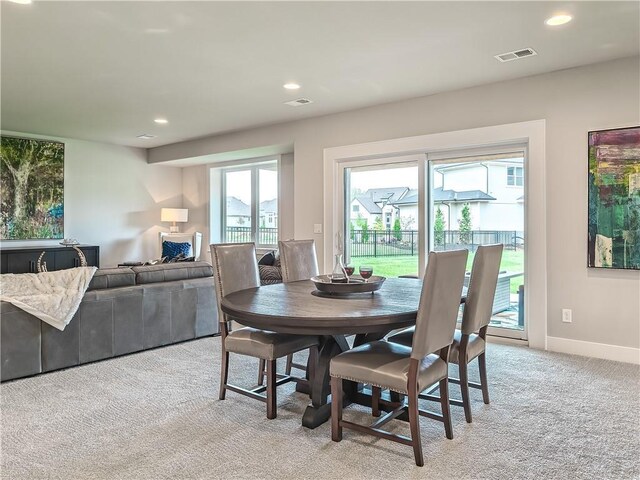 16724 Hayes St, Overland Park, KS 66085 - dining area with light carpet, recessed lighting, and baseboards