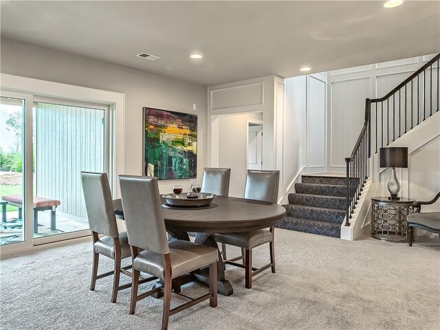 16724 Hayes St, Overland Park, KS 66085 - carpeted dining area with stairs and recessed lighting