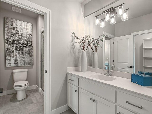 16724 Hayes St, Overland Park, KS 66085 - full bath with vanity, toilet, a shower stall, and baseboards