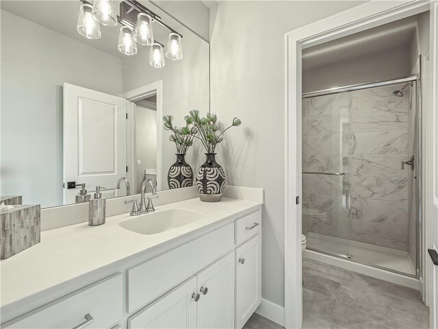 16724 Hayes St, Overland Park, KS 66085 - full bathroom featuring a stall shower, vanity, and toilet