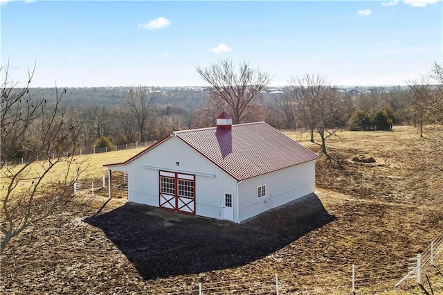 exterior space featuring a rural view