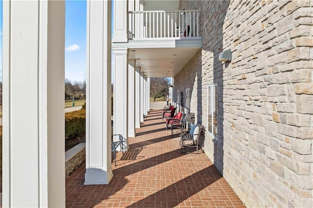 view of patio / terrace with a balcony