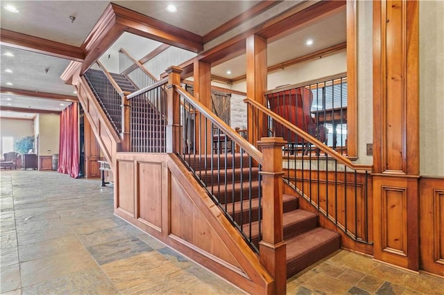 interior space with crown molding, beam ceiling, and tile floors