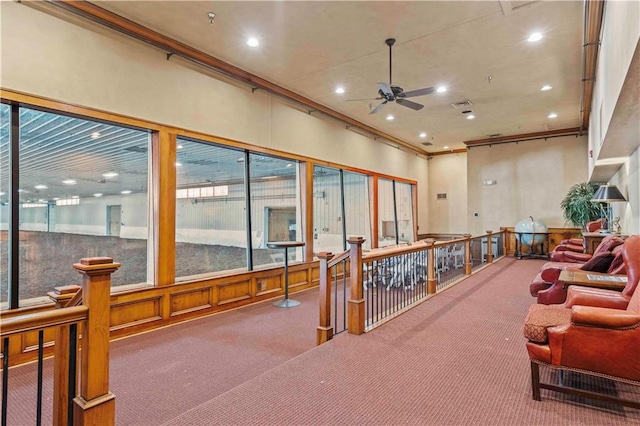 interior space featuring ceiling fan