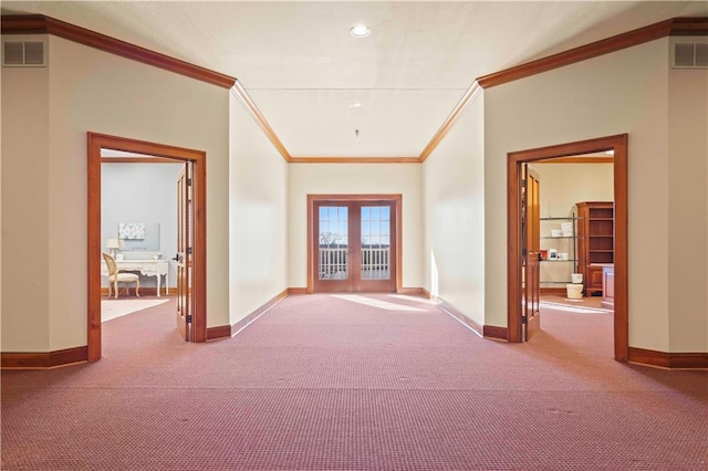 interior space featuring carpet, french doors, and ornamental molding