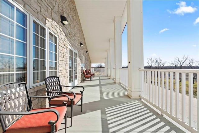 balcony featuring covered porch