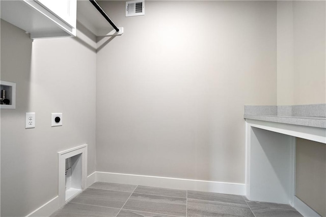 laundry room with hookup for an electric dryer, washer hookup, and tile floors