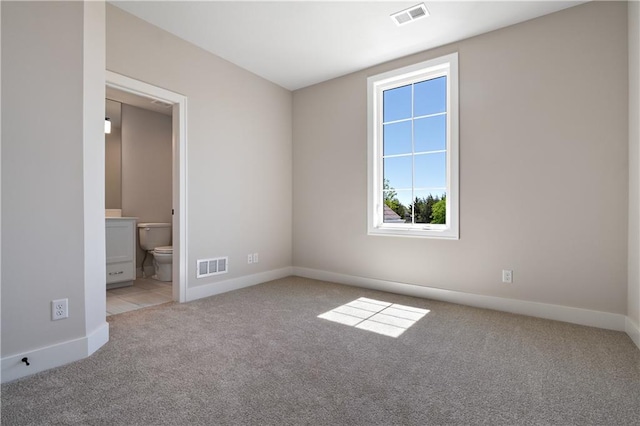 empty room with carpet floors