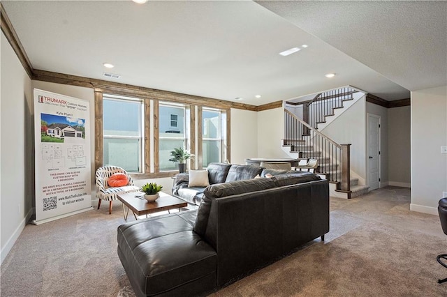 living room with light carpet, a textured ceiling, and crown molding