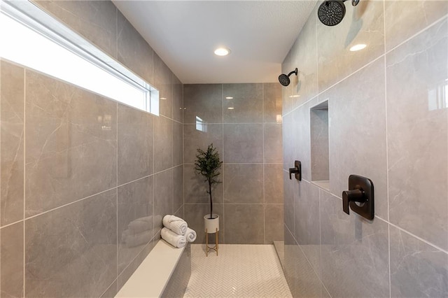 bathroom featuring tiled shower