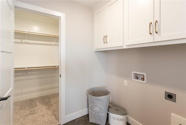 laundry room with cabinets, hookup for a washing machine, carpet, and electric dryer hookup