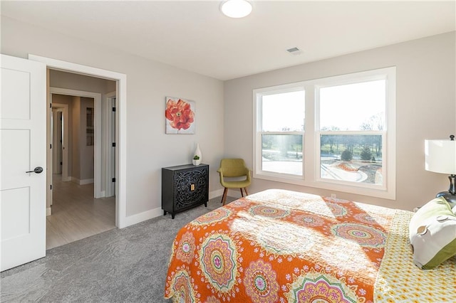 bedroom featuring carpet