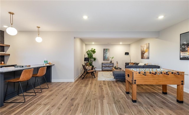 playroom with light wood-type flooring