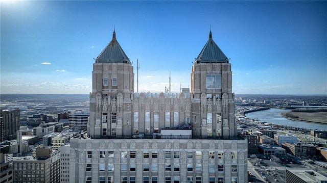 property's view of city with a water view