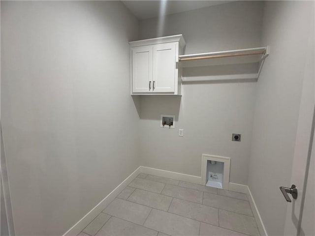 clothes washing area with cabinets, hookup for a washing machine, light tile patterned floors, and electric dryer hookup