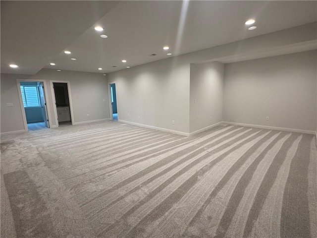 spare room with light carpet