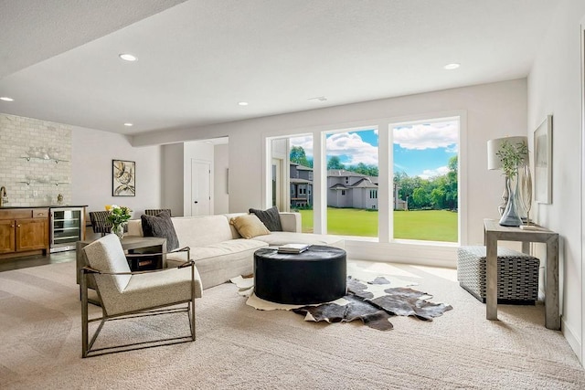 16735 S Hall St, Olathe, KS 66062 - carpeted living room with indoor bar and beverage cooler